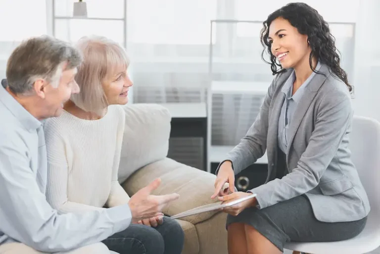 Financial advisor scheduling meeting times on a calendar.
